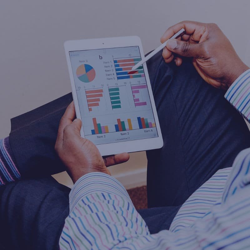 man holding a tablet